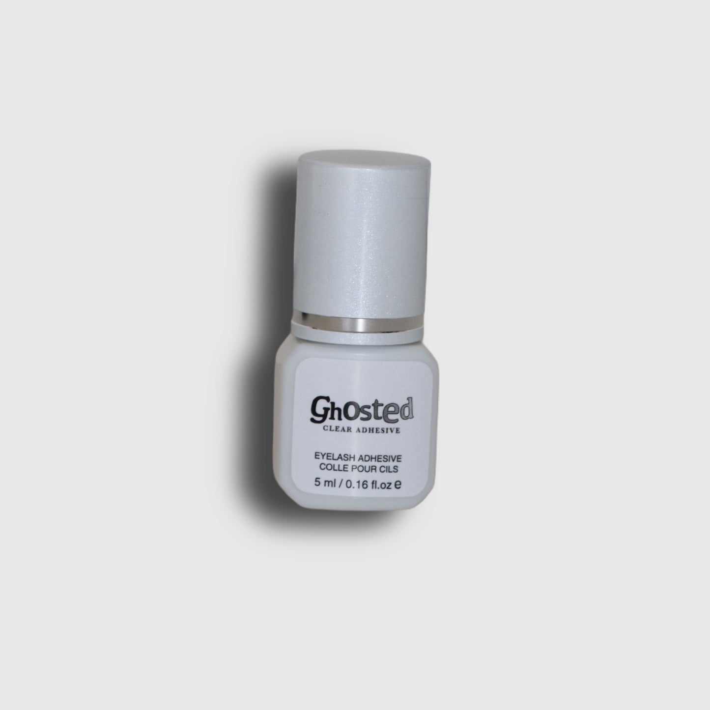 Ghosted clear adhesive