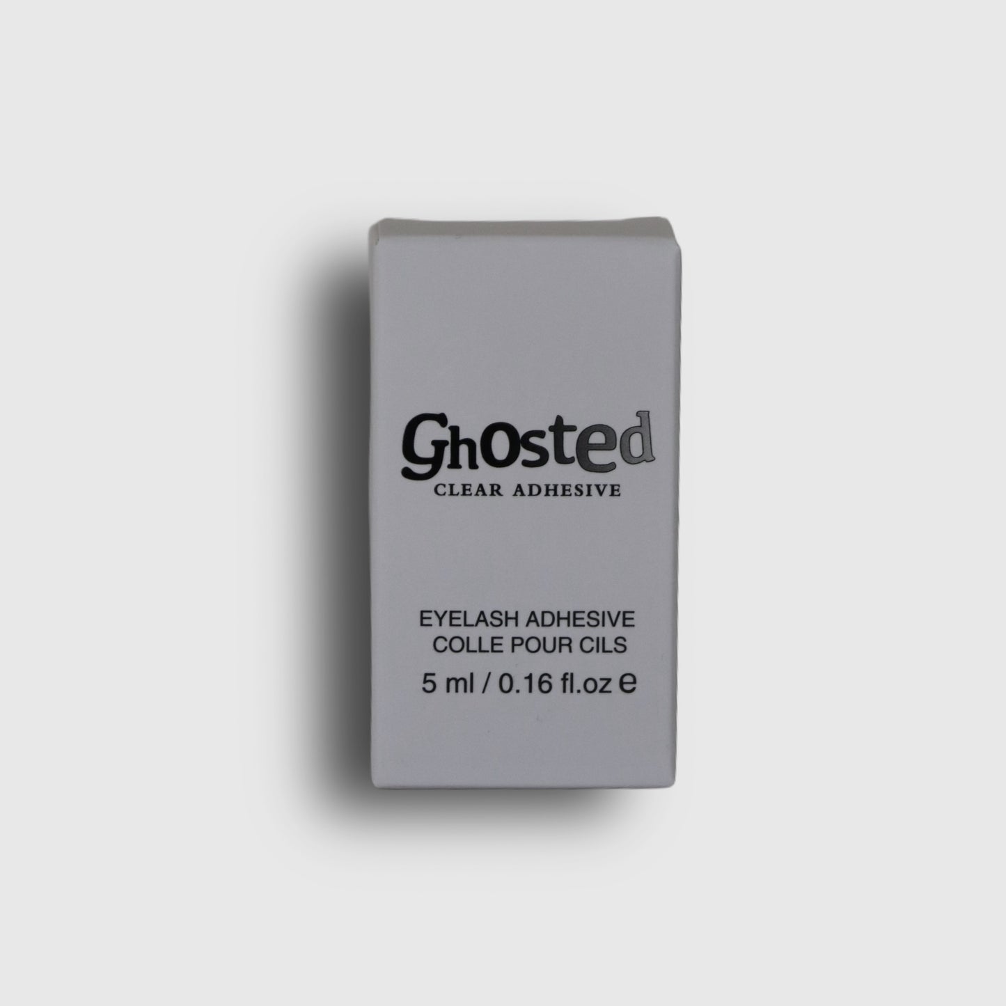 Ghosted clear adhesive